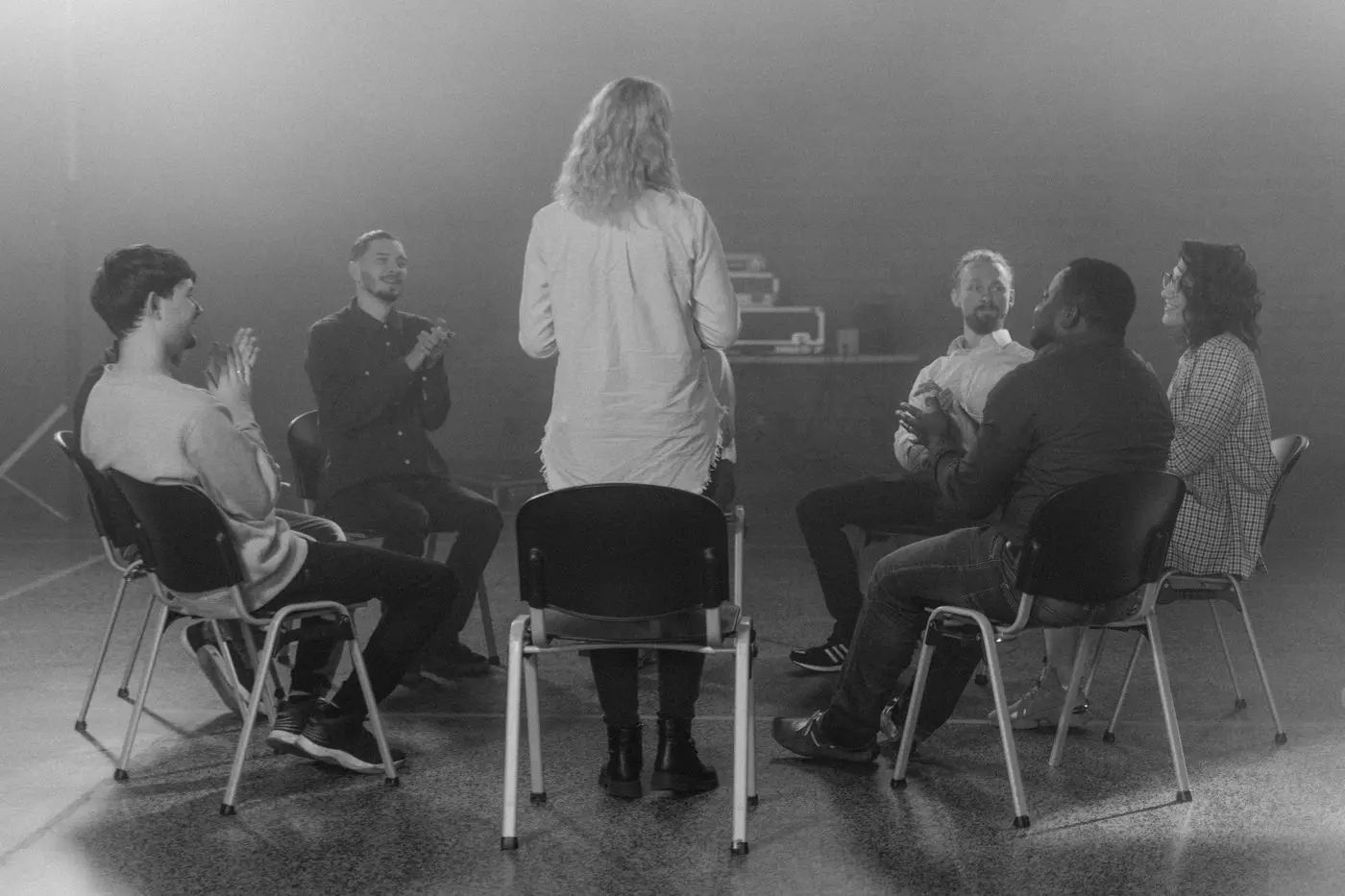 A group coaching session in a quiet room